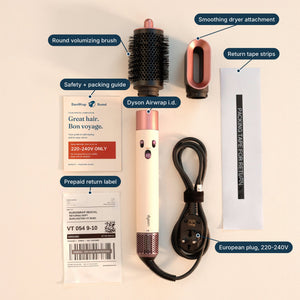 EuroWrap rental kit laid out: 220–240V Dyson Airwrap, Fast Dryer, styling attachment, travel case and prepaid return label